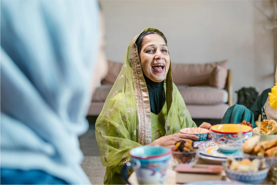 image of woman with cheery face at gathering