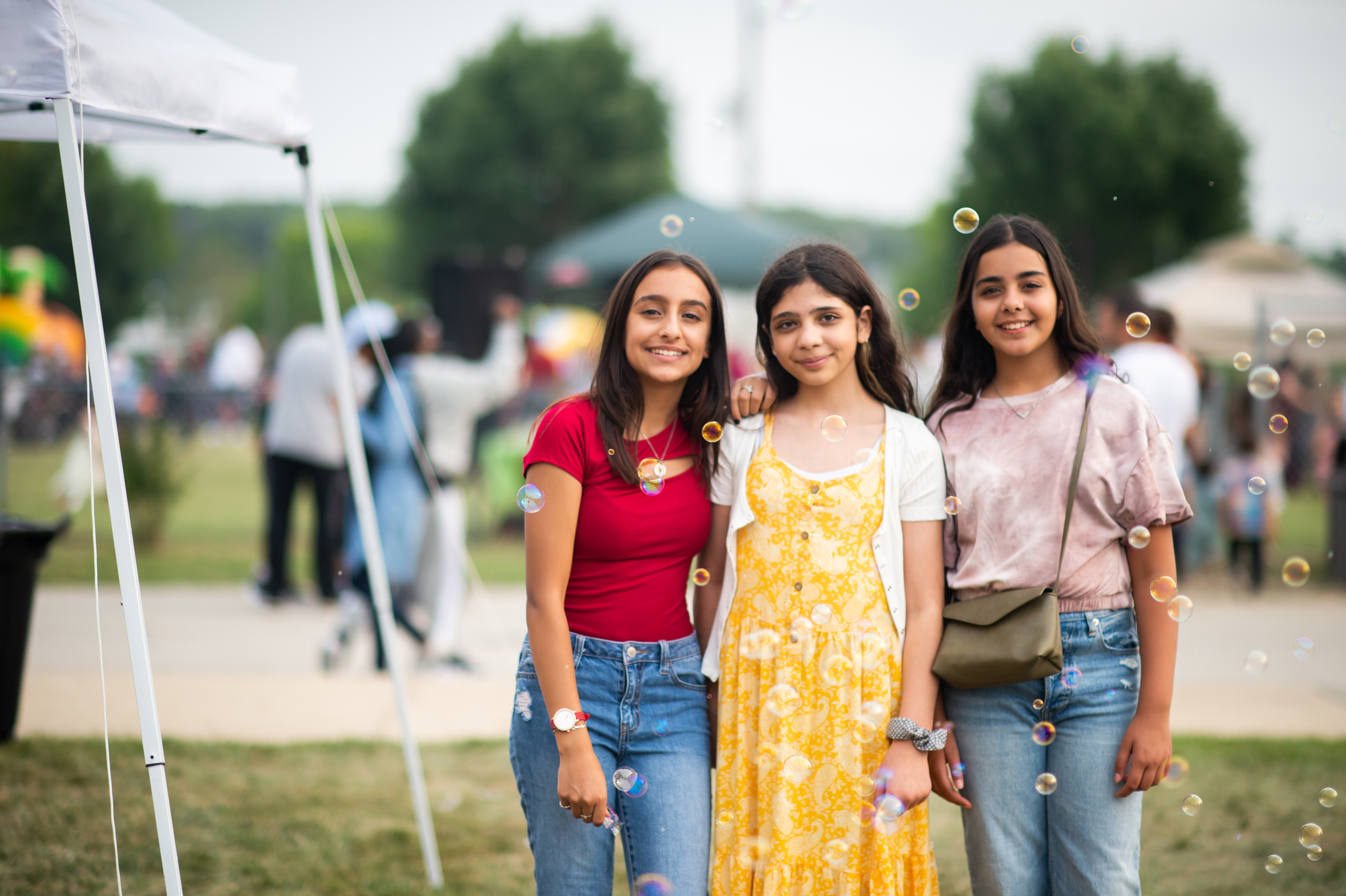 image of young girls standing together at eid festival